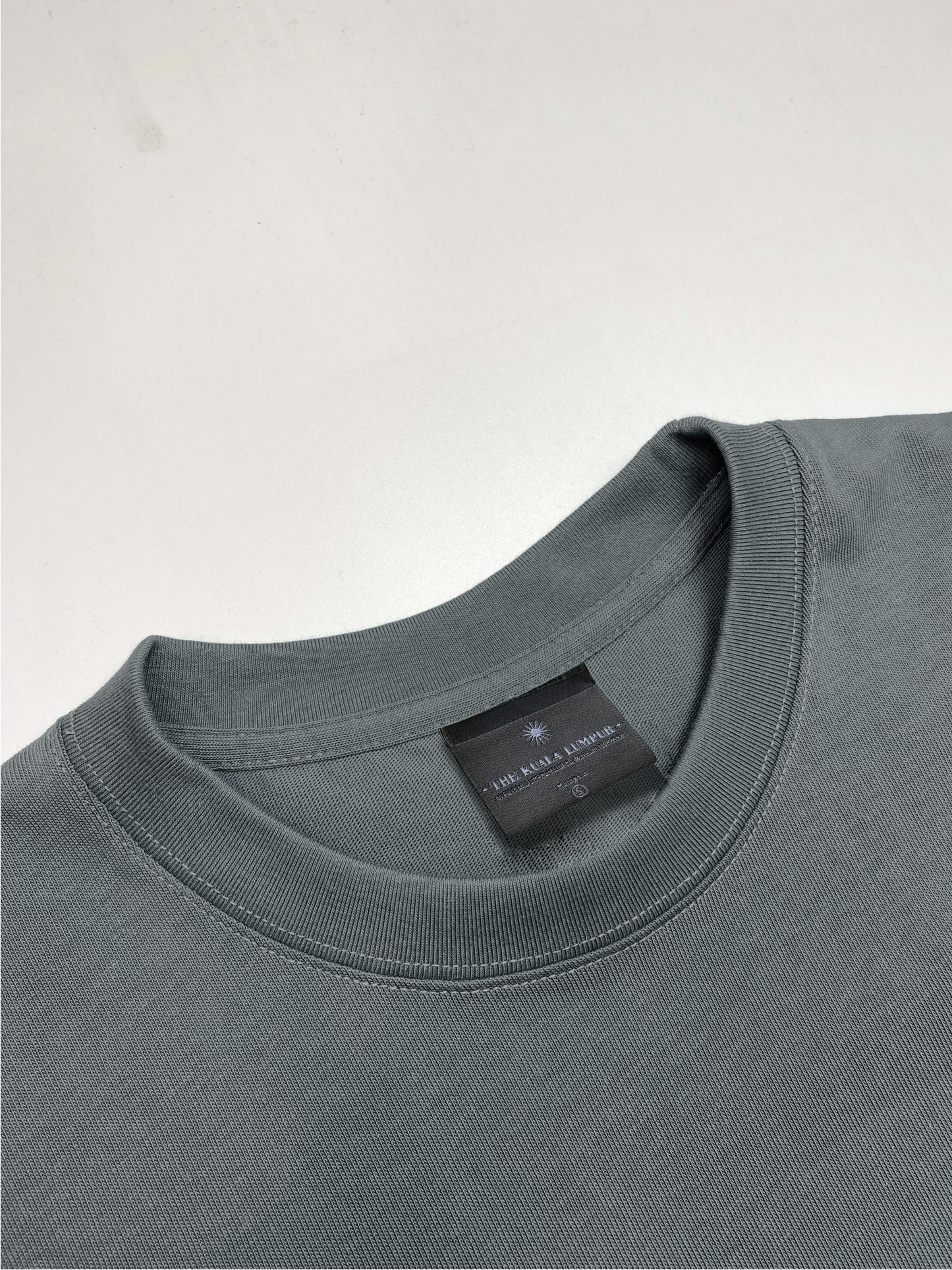 The “HEAVYWEIGHT” Shirt - “CHARCOAL.”