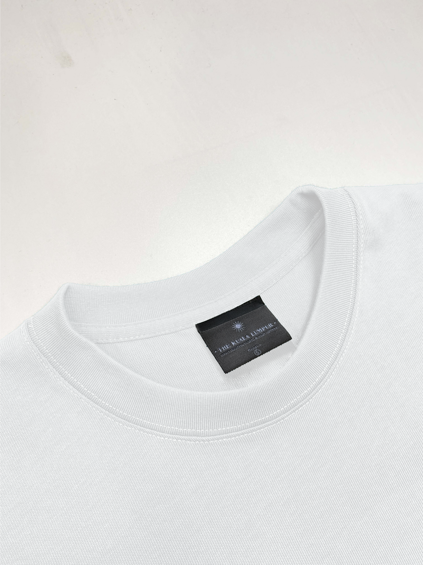 The “HEAVYWEIGHT” Shirt - “WHITE.”